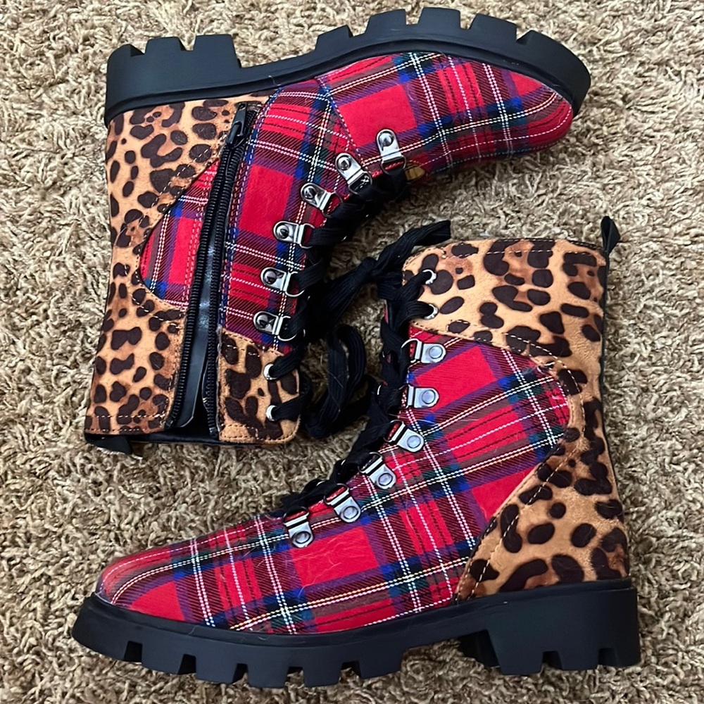 Red plaid and cheetah print lace up combat boots.